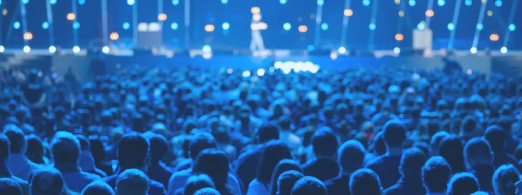 Sitting in a Large Auditorium at a Conference